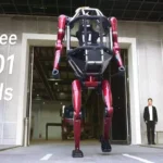 photograph of Unitree's new manned mech robot which can switch between humanoid and quadruped modes