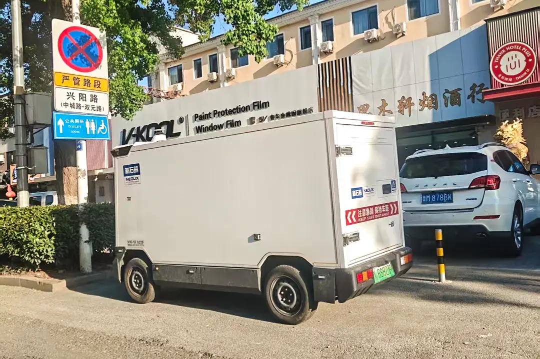A Neolix robovan parked in a Qingdao street.