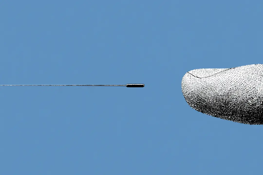 illustration of an AI-powered six-axis force sensor developed by Chinese researchers set next to a finger to show is miniature size