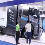 a heavy-duty truck powered by a SinoHytec hydrogen fuel cell engine on display at the Beijing International Convention and Exhibition Center.
