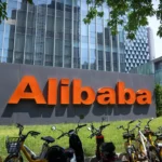 photograph shows Alibaba's orange logo outside the company's offices in Beijing