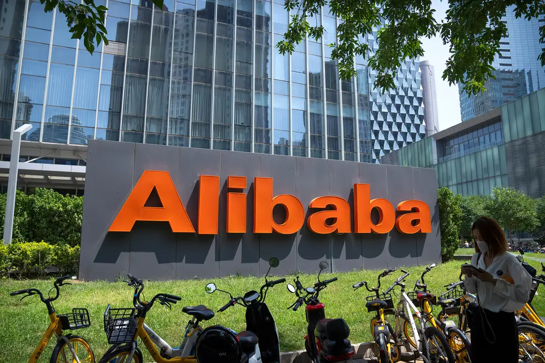 photograph shows Alibaba's orange logo outside the company's offices in Beijing