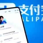 The image shows the interface of the AI ​​version of Alipay and the Alipay logo.