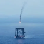 Photograph of the Long March 10B booster landing into a net in the South China Sea