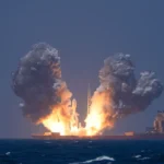 photograph shows Orienspace's Gravity-1 Y4 carrier rocket launches nine satellites from waters east of Shanghai on July 22