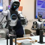 Photograph shows a robot made by Robbyant on display at the World AI Conference