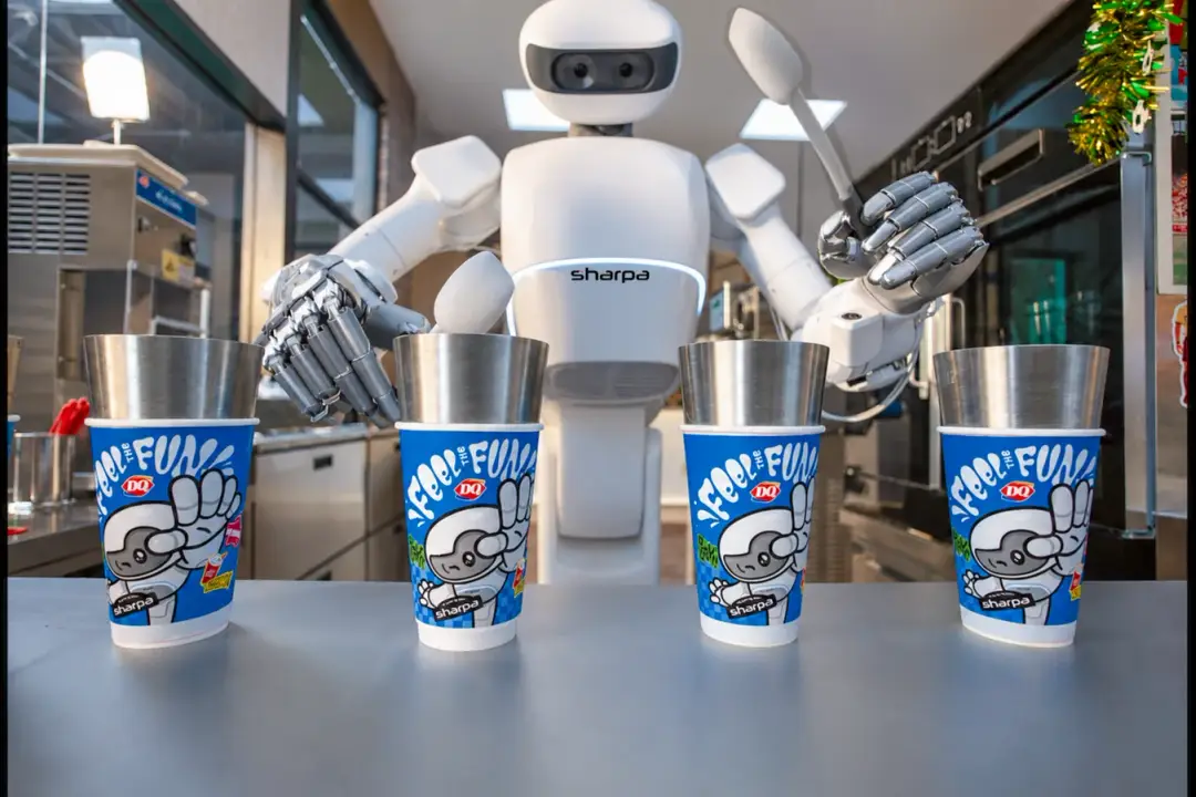 photograph shows Sharpa's robot serving Dairy Queen Blizzard ice cream at a store in Shanghai