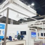 Picture shows a Zhongji InnoLight stand at an AI exhibition
