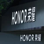 Photograph shows the English and Chinese name of Honor on a black background