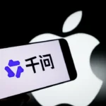 Picture shows a smartphone with the Qwen logo and the Apple logo in the background
