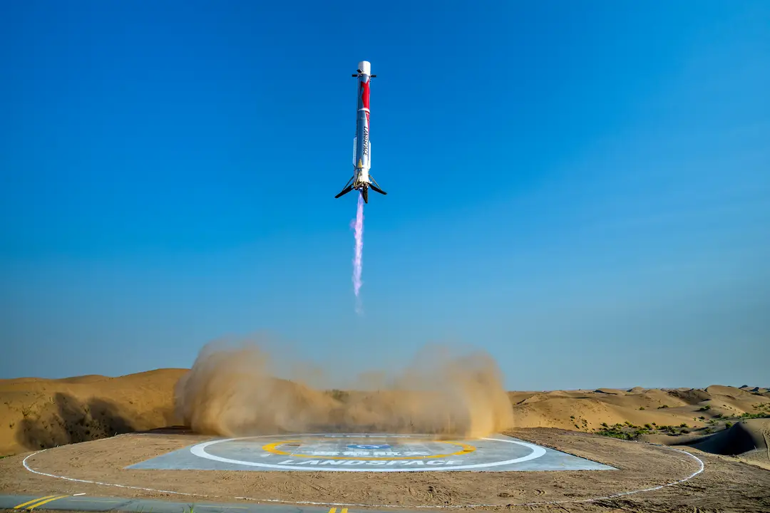 Picture shows LandSpace's reusable Zhuque-3 (Y2) first-stage performing a powered vertical recovery with landing legs at its designated recovery site