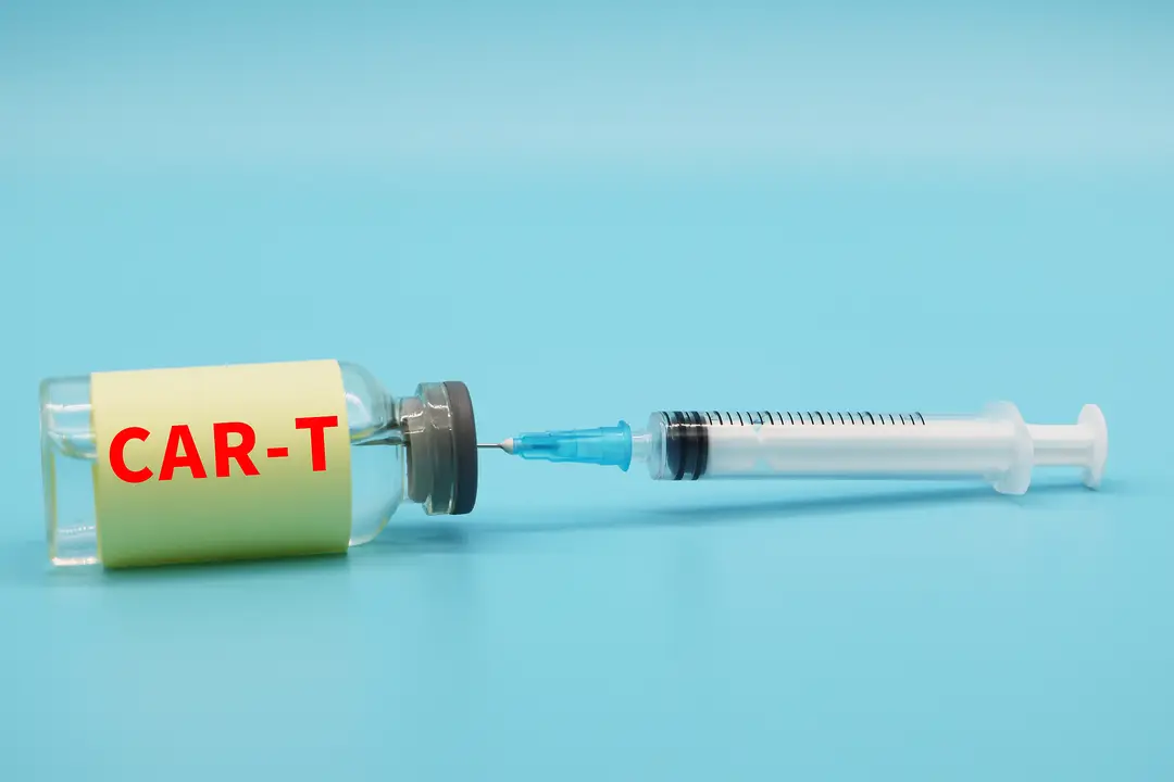 Photograph shows a vial of CAR-T with a syringe attached