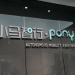 Photograph shows Pony.ai's logo and name in Chinese and English