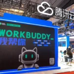 Photograph shows Tencent promoting its WorkBuddy AI agent at an exhibition in Shanghai in June
